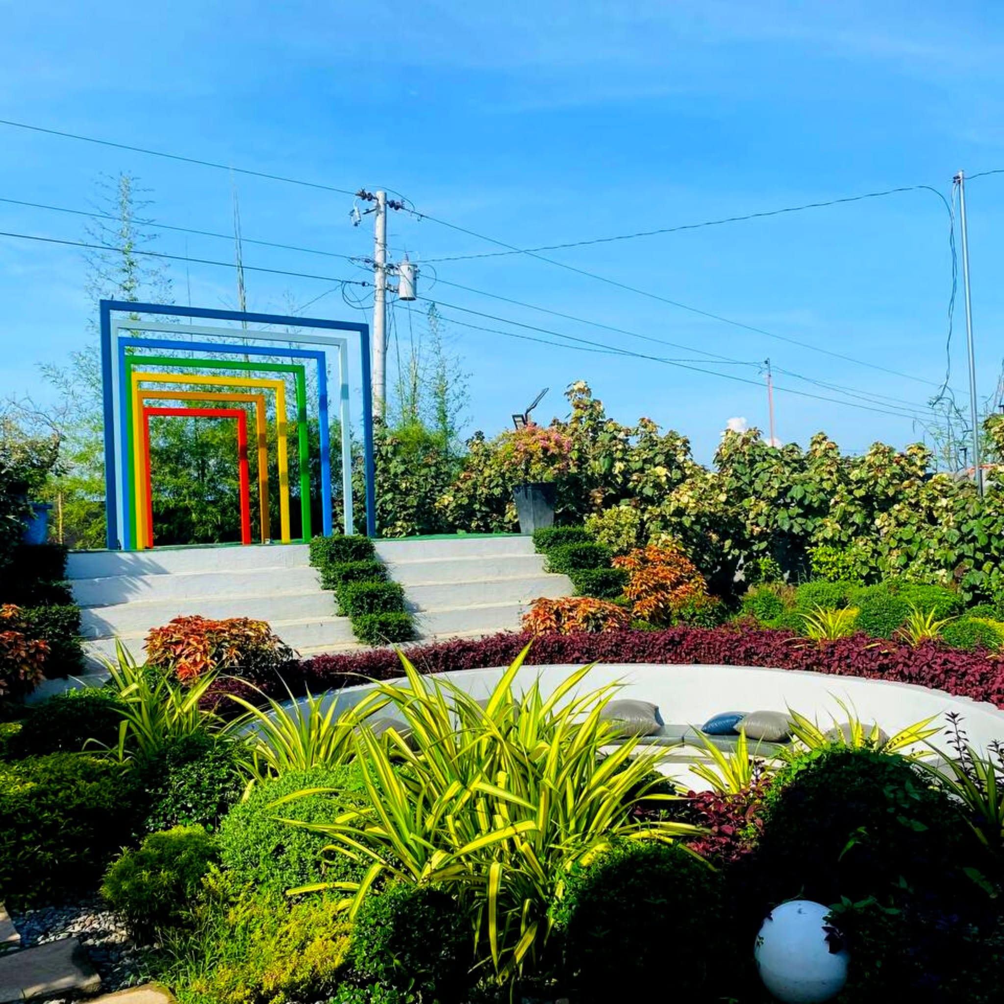 Colorful rectangular arches and landscaped plants at D’ Garden at Calatao