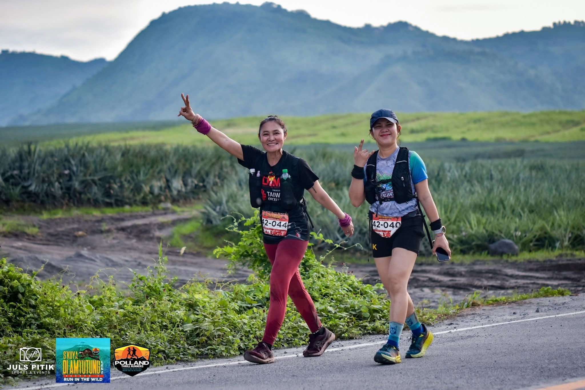 Irene Tan with another trail runner on a mountain road