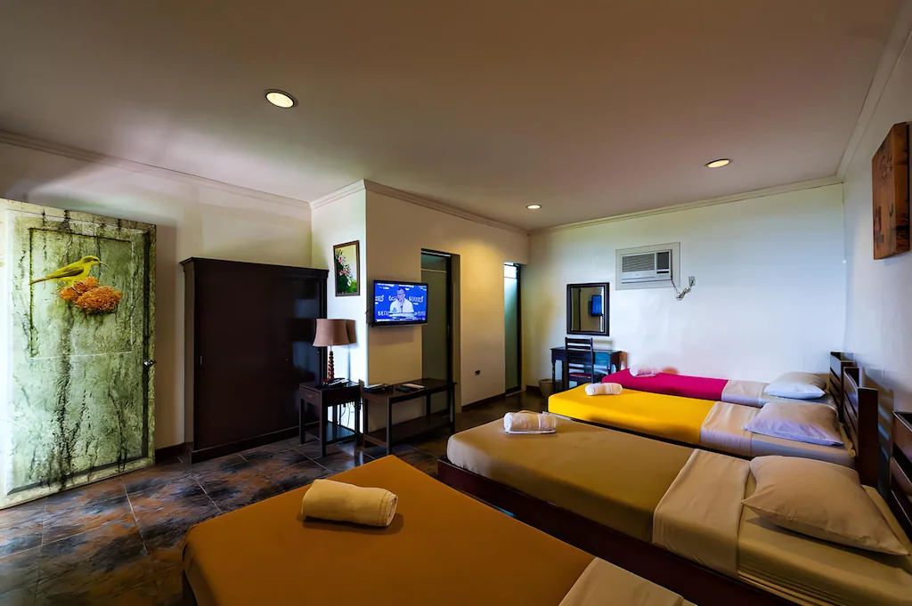 Family room with multiple beds at Sarangani Highlands Garden