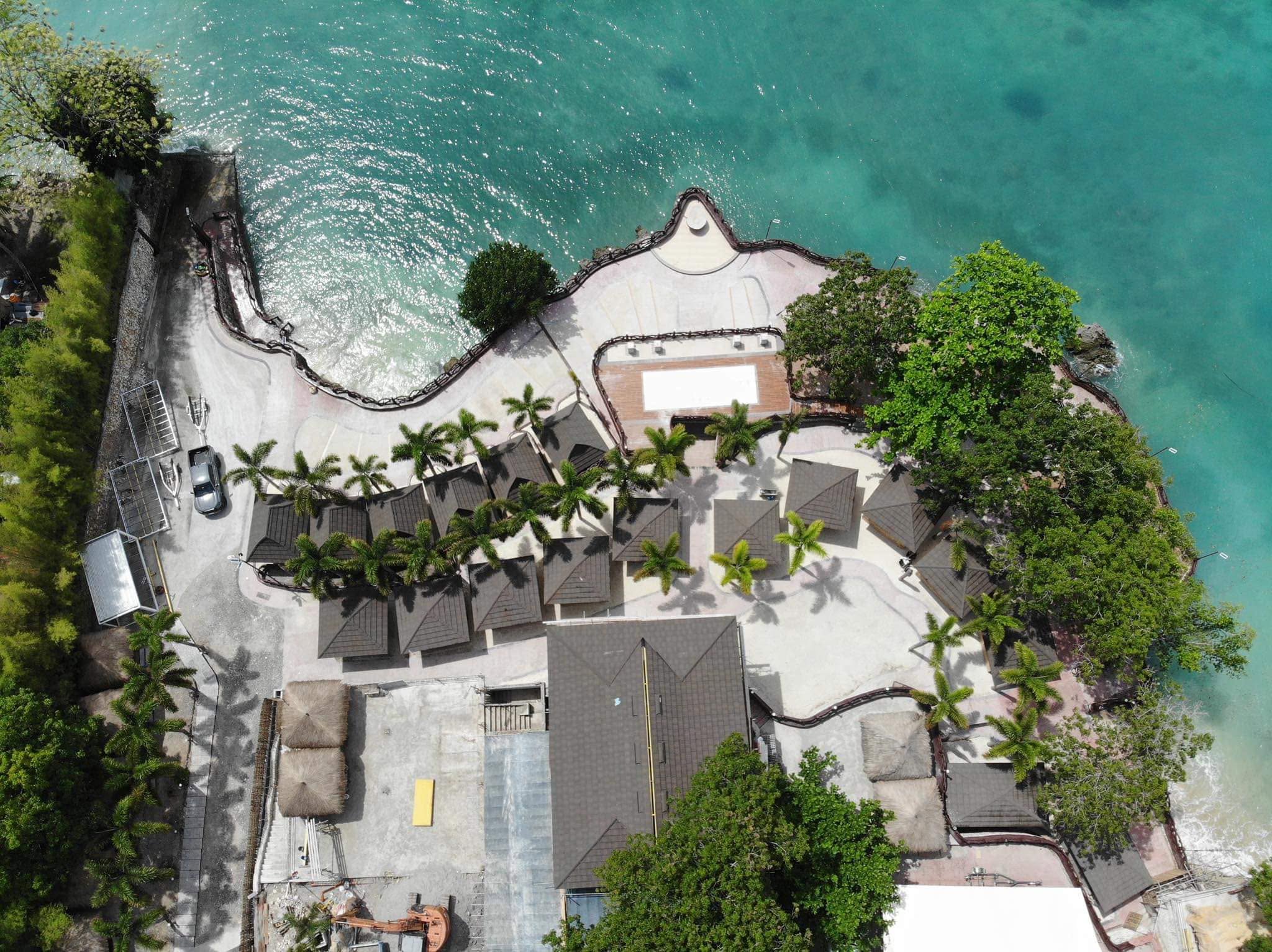 Overhead aerial view of Seascape View Resort beside the coastline